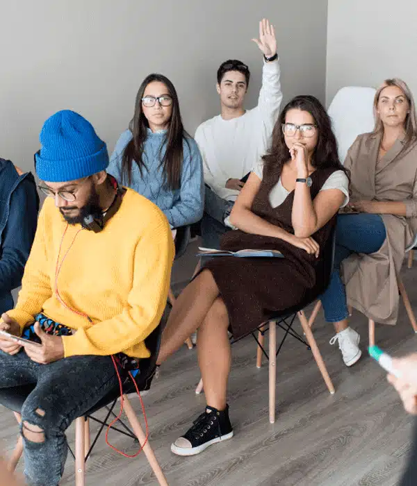 Student raising hand for asking question