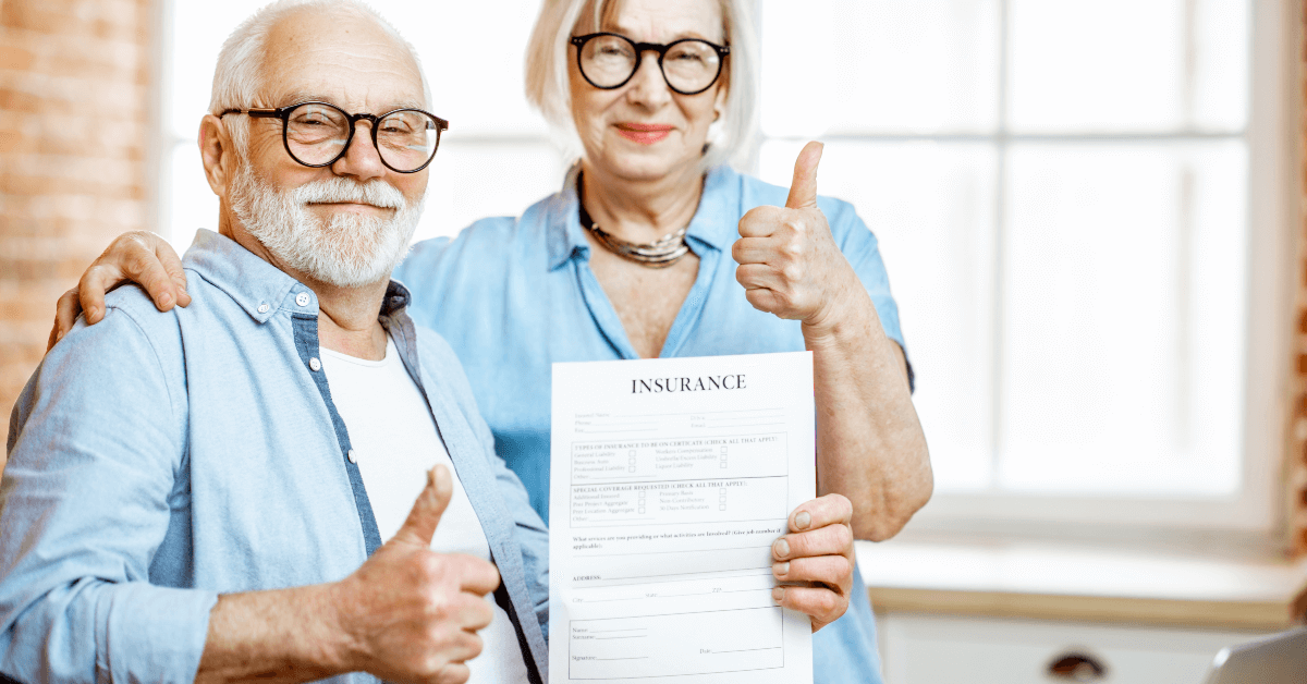 happy-senior-couple-with-insurance